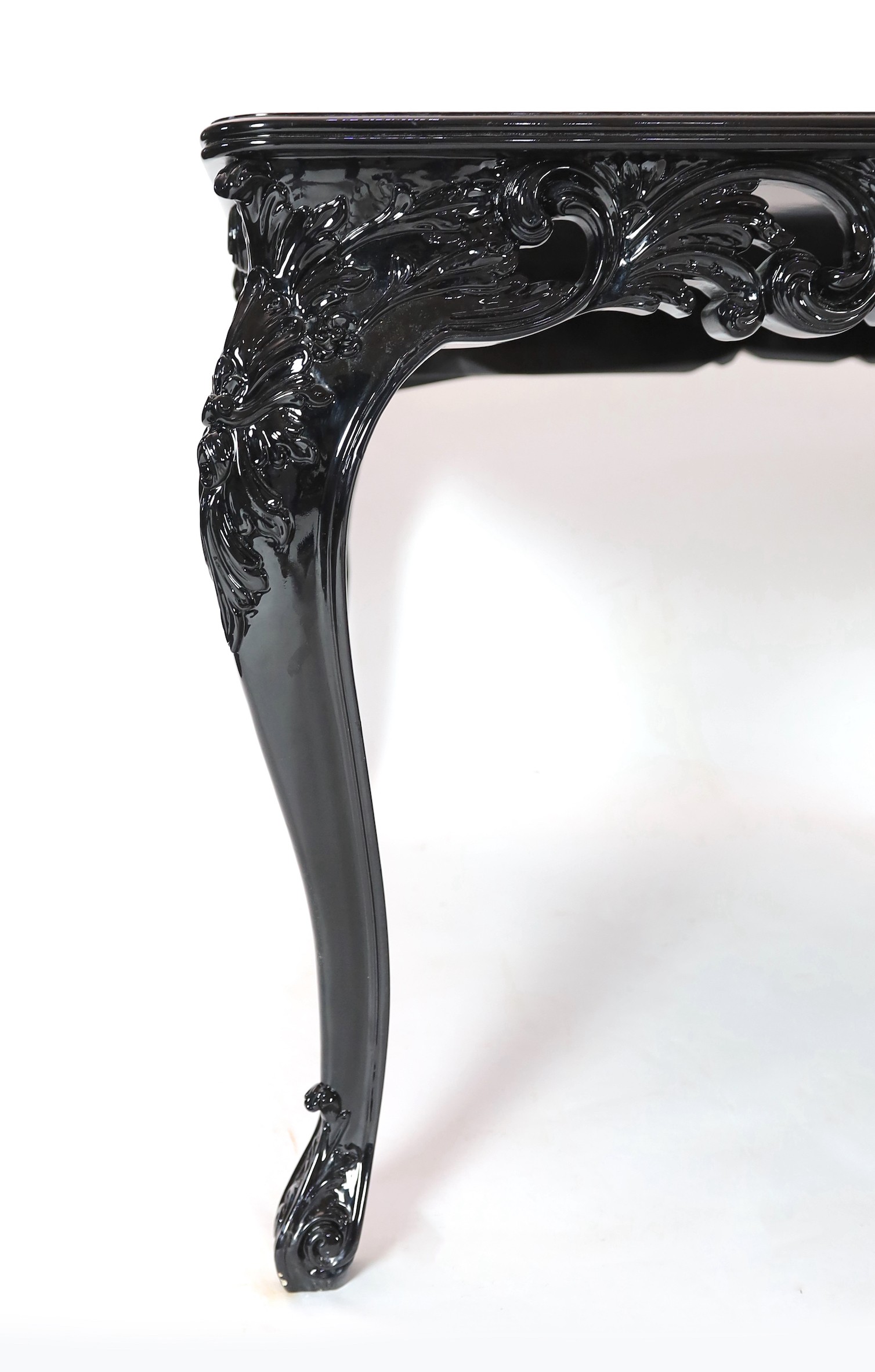 A contemporary Boca Do Lobo palissandre and black lacquer 'Royal' dining table, with parquetry veneered top on ebonised underframe with cabriole legs, scroll carved to two opposing legs and geometric carving to the other